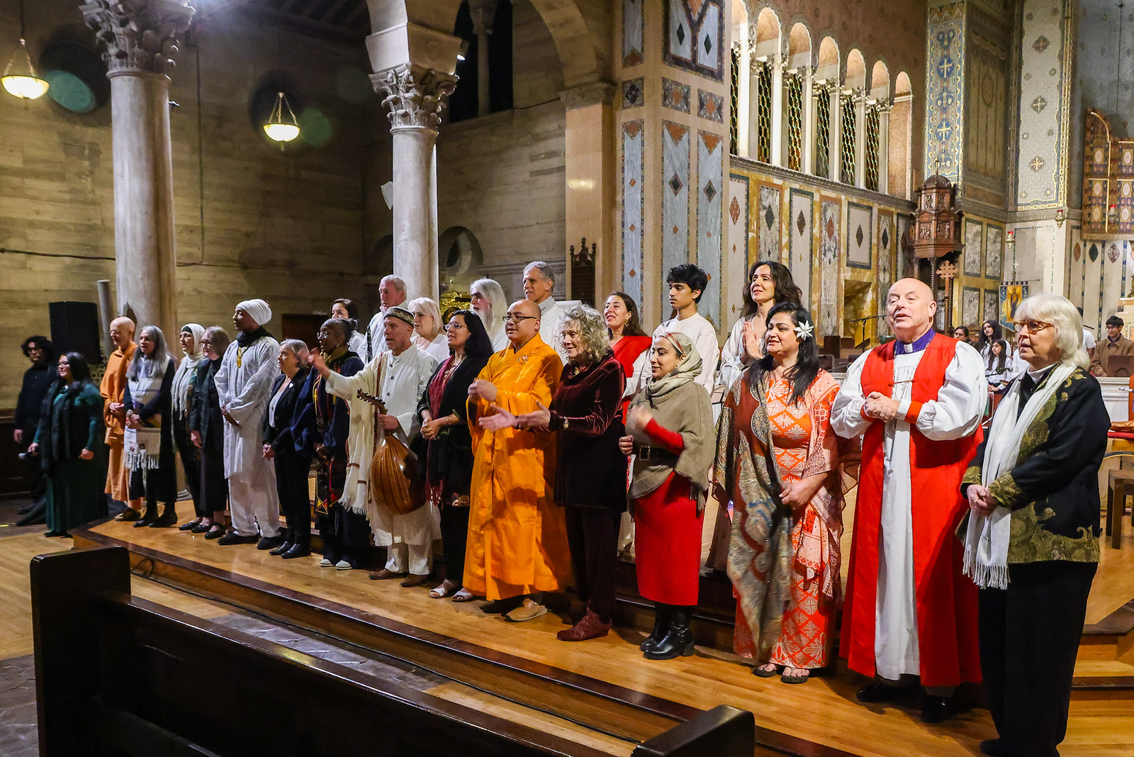 Interfaith group of people on a stage