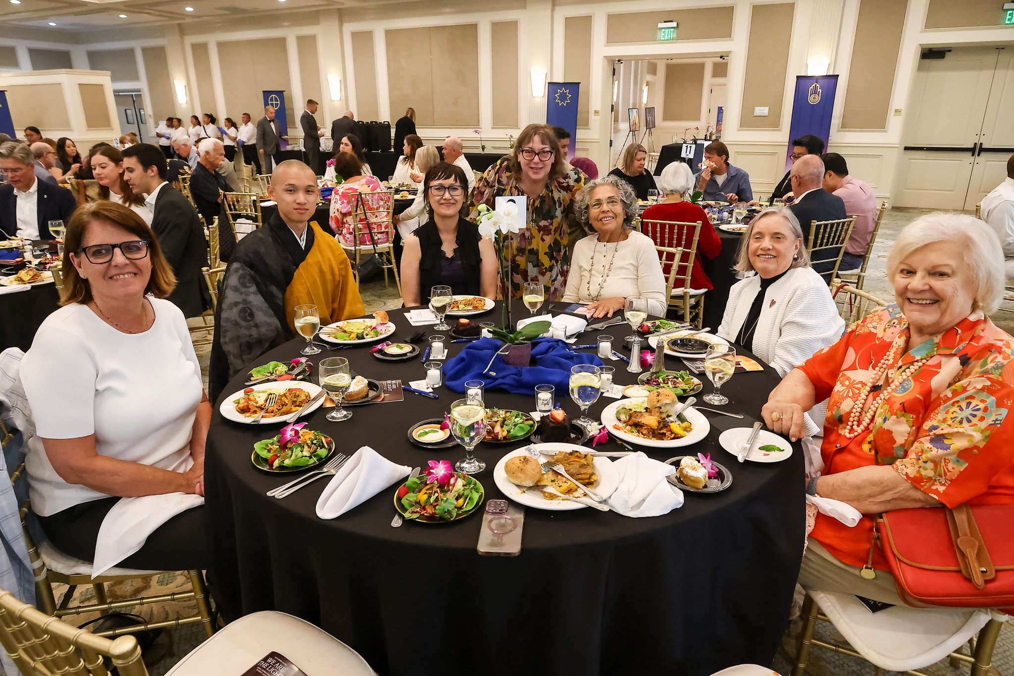 Group at a table at the Guibord Gala July 17 2025