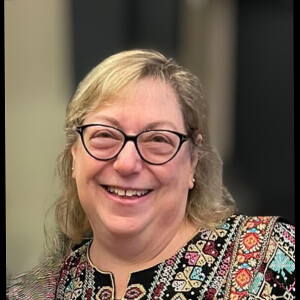 Dr. Lo Sprague, President of The Guibord Center